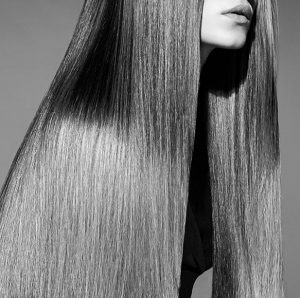 A woman with straightened long hair