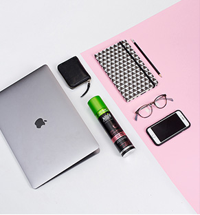 Apple's laptop, wallet, Natural Formula's bottle, diary, pencil, eyeglasses and mobile phone